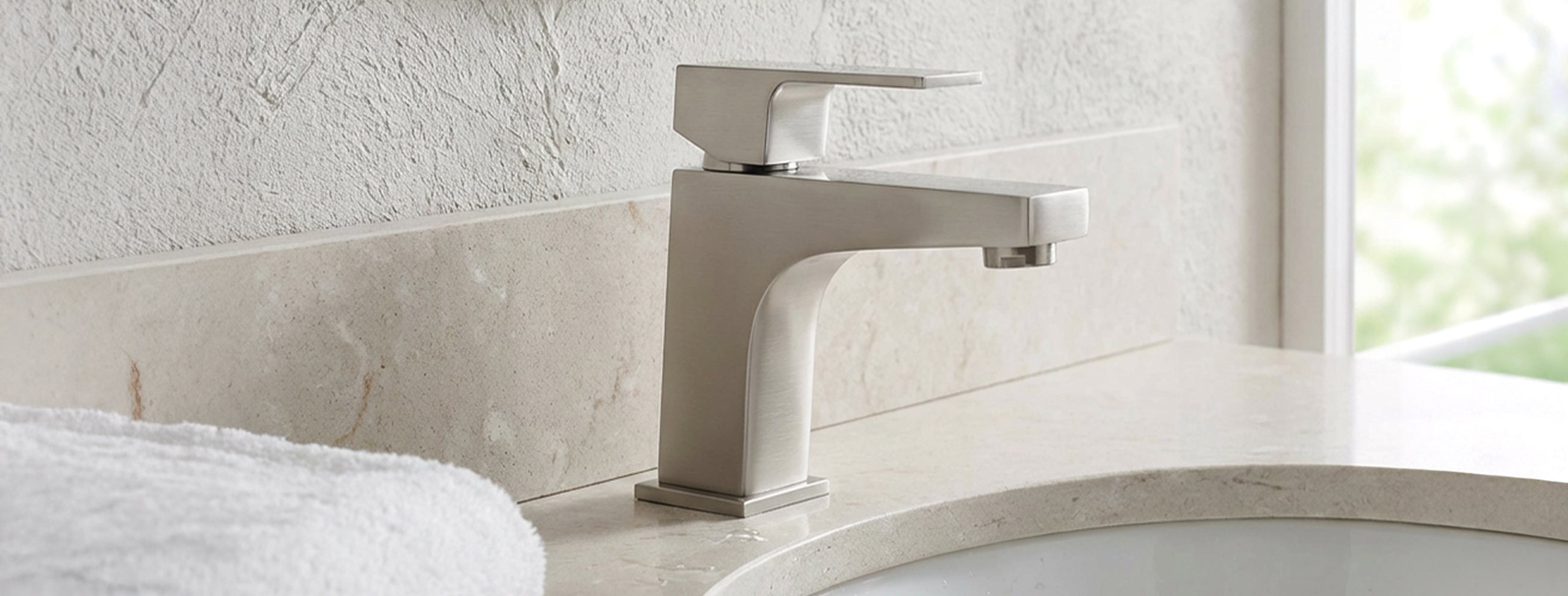 Modern bathroom faucet on a sink.